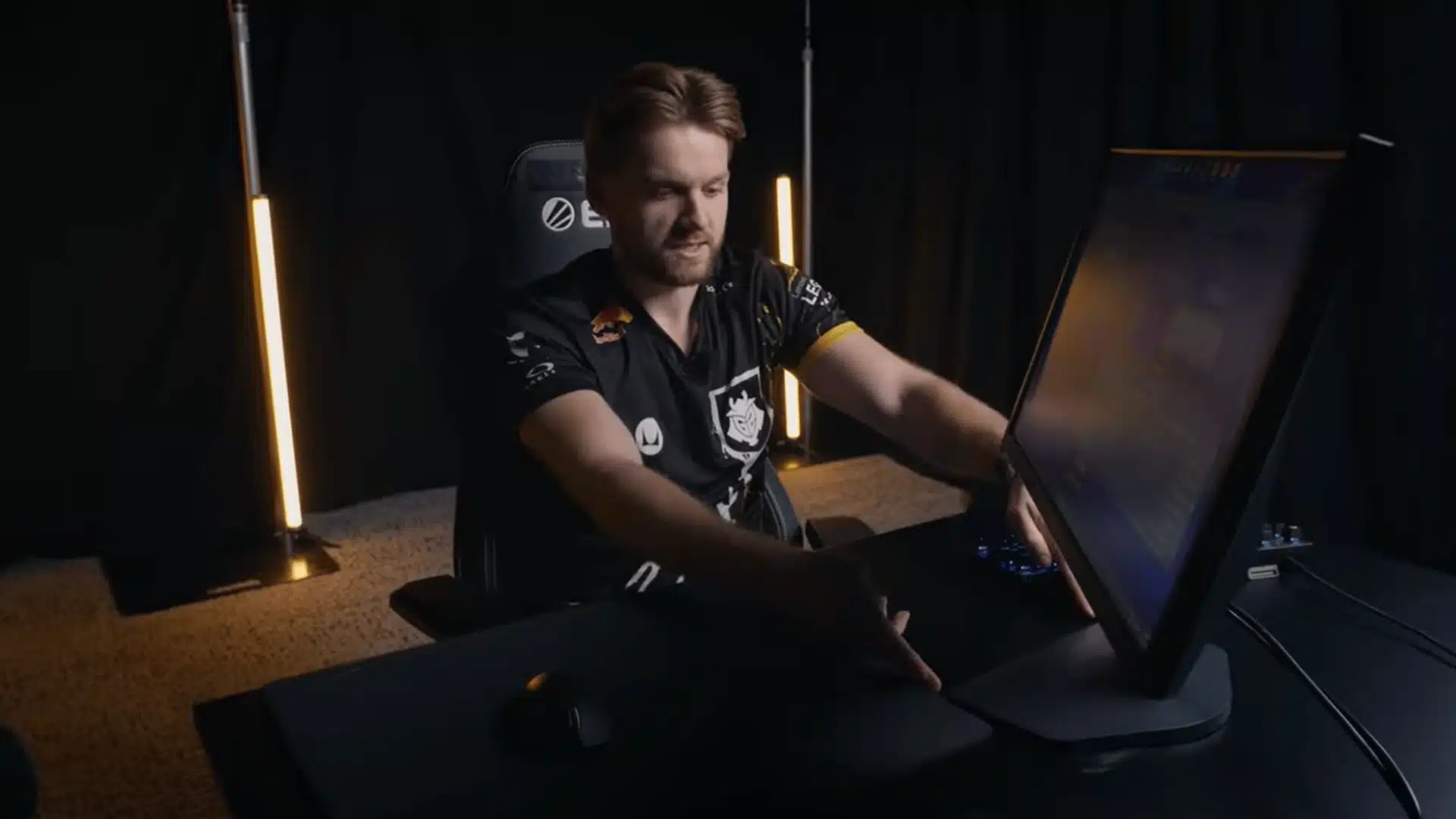 Pro gaming gear placement with monitor, keyboard, and mouse setup