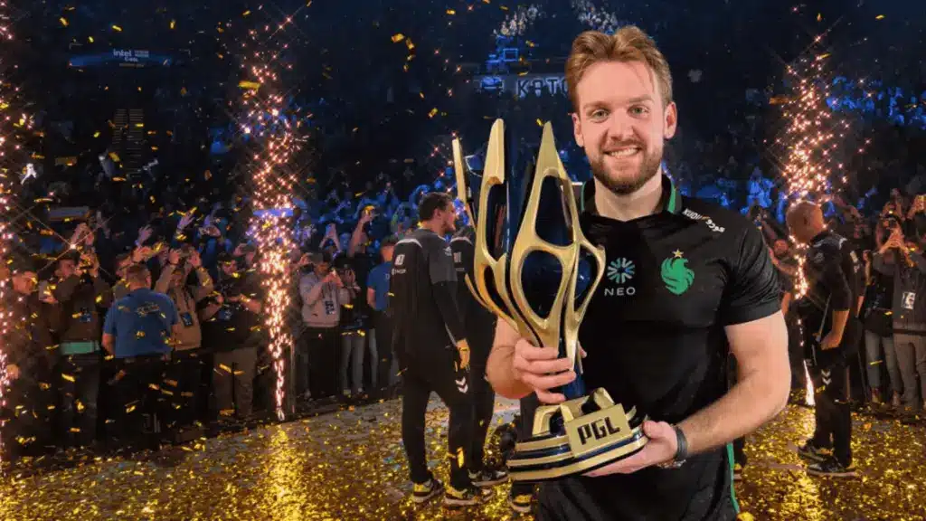 NiKo holding PGL trophy at CS2 Major tournament celebrating victory with Falcons Esports team