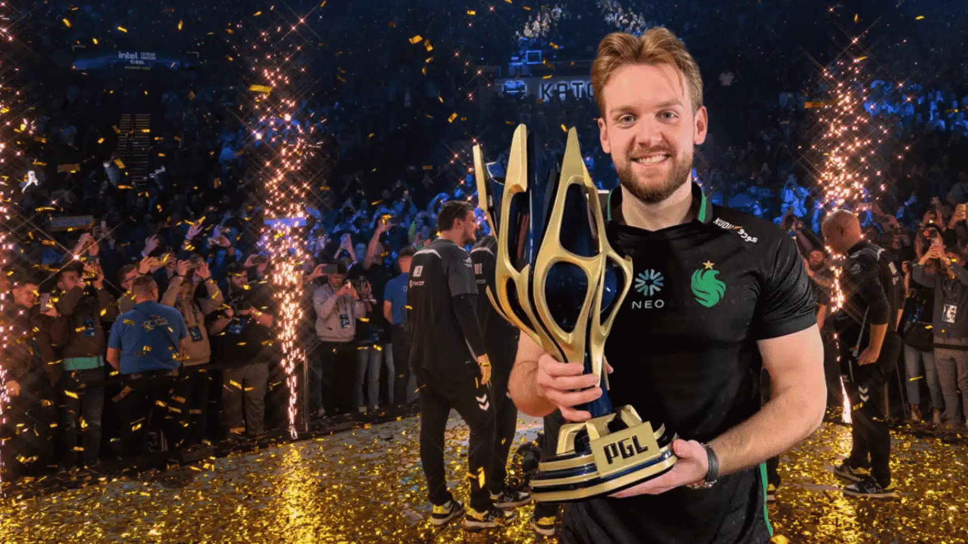 NiKo holding PGL trophy at CS2 Major tournament celebrating victory with Falcons Esports team