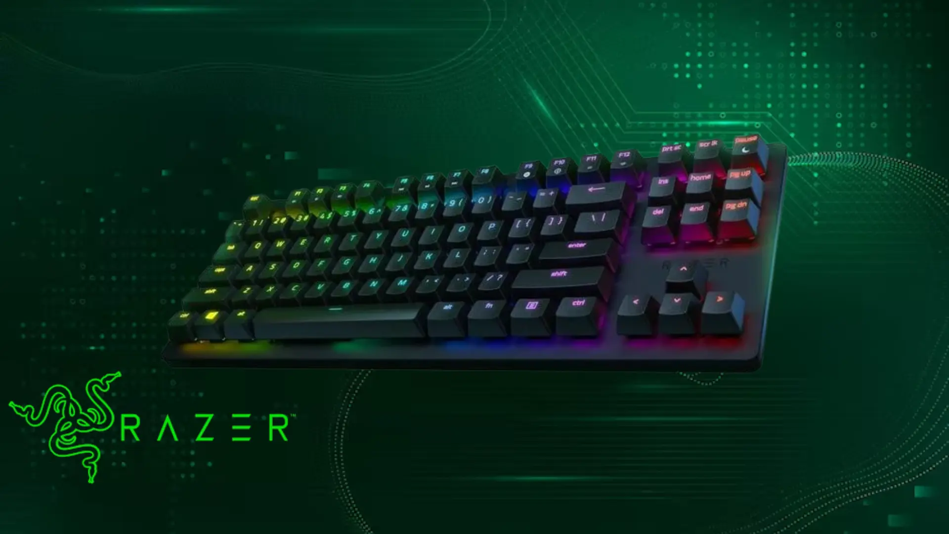 RGB gaming keyboard with green lighting and Razer logo on dark background
