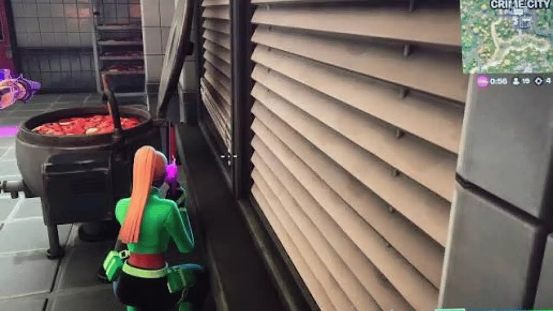 Fortnite gameplay screenshot showing a player hiding indoors while spectating a battle royale match.