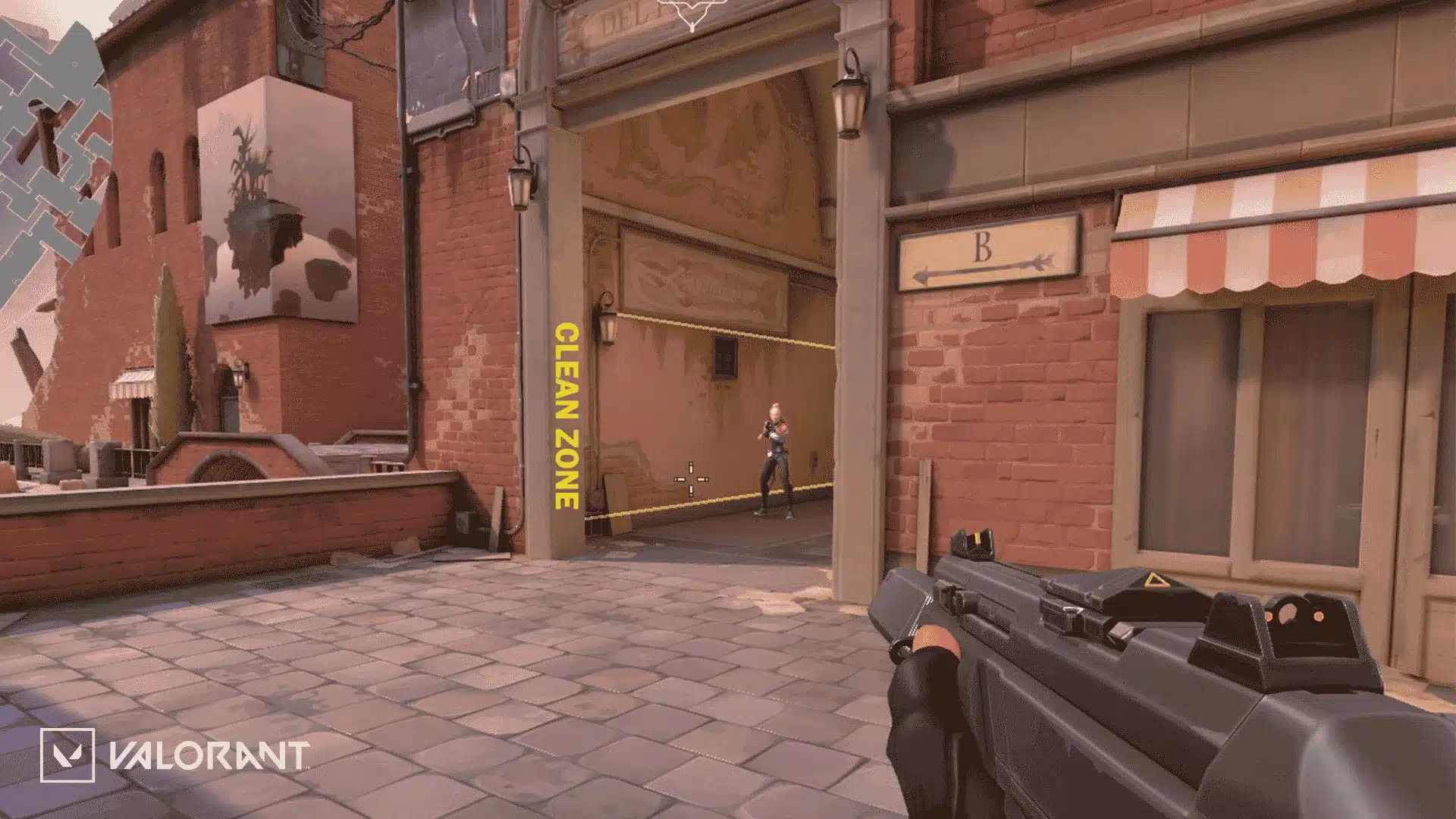 Valorant Ascent gameplay scene showing a player aiming at an enemy near B site entrance.