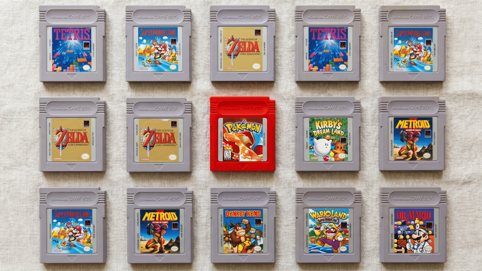 Game Boy cartridges of multiple classic titles displayed on a neutral surface
