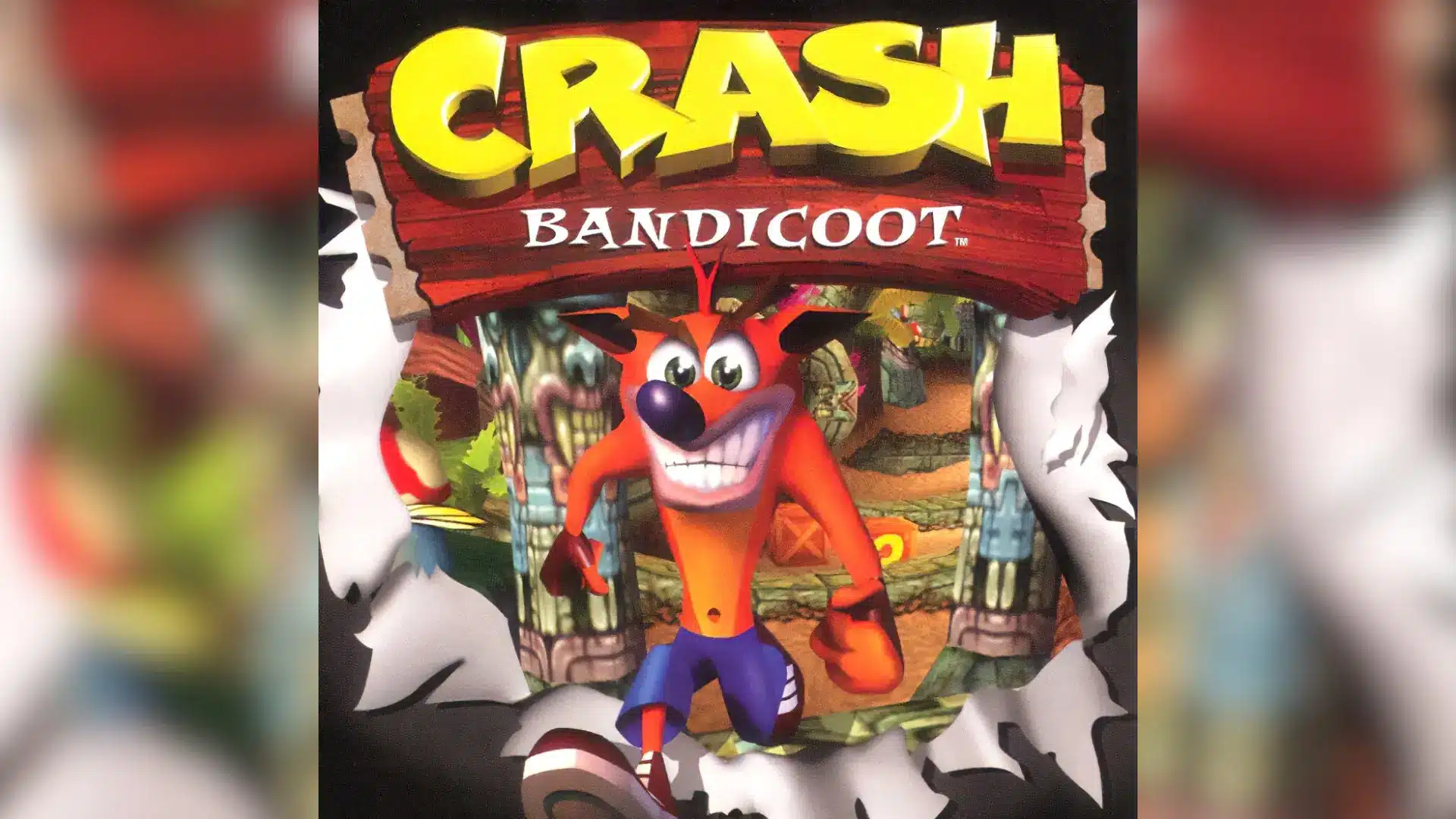 Crash Bandicoot, an orange marsupial character, smiles and bursts through a torn paper background.