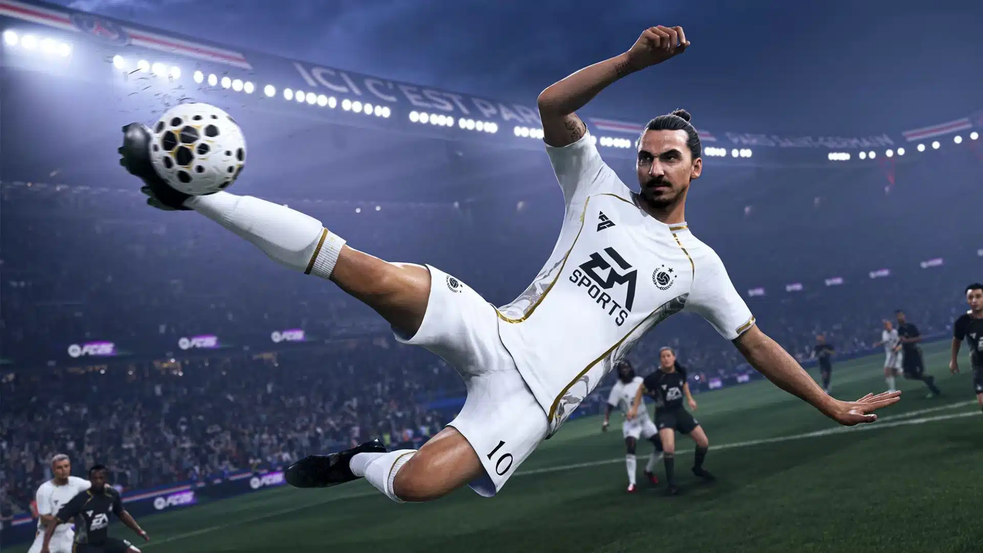 Football player performs a flying kick toward the ball inside a brightly lit stadium