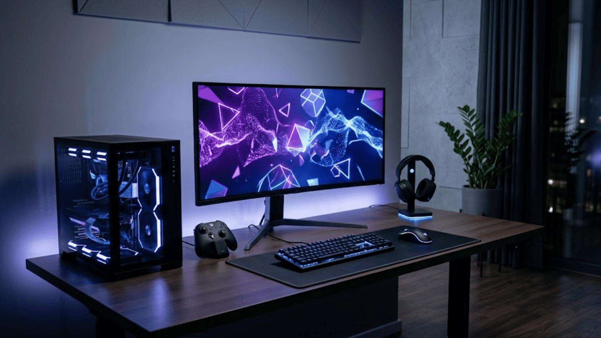 Minimalist gaming setup with RGB PC, ultrawide monitor, and gaming accessories in a modern room.
