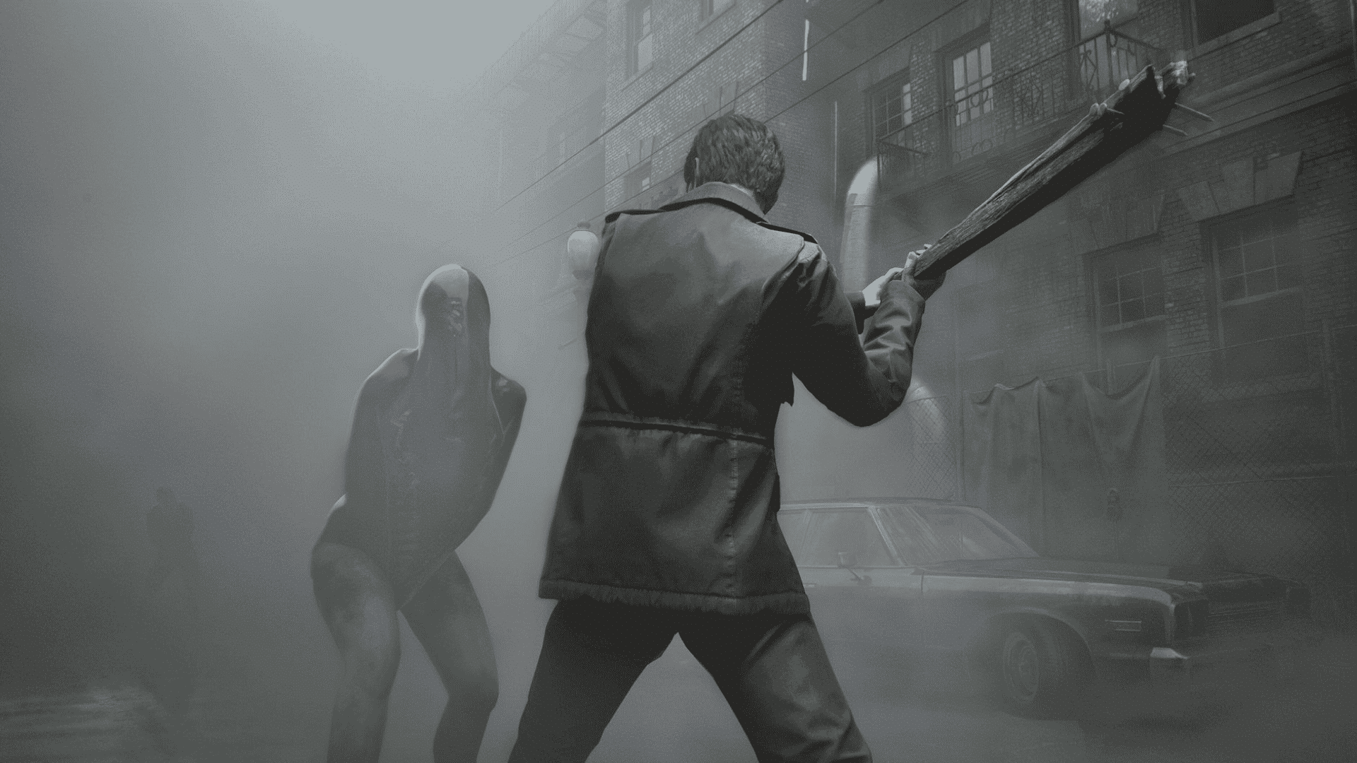 James Sunderland stands in heavy fog, aiming a wooden plank at a Lying Figure in Silent Hill 2