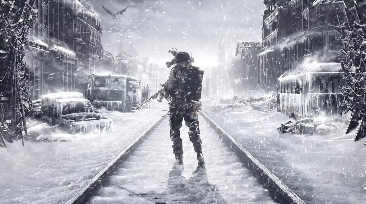 Lone masked figure walks along snow covered train tracks through a blizzard in a ruined frozen city.
