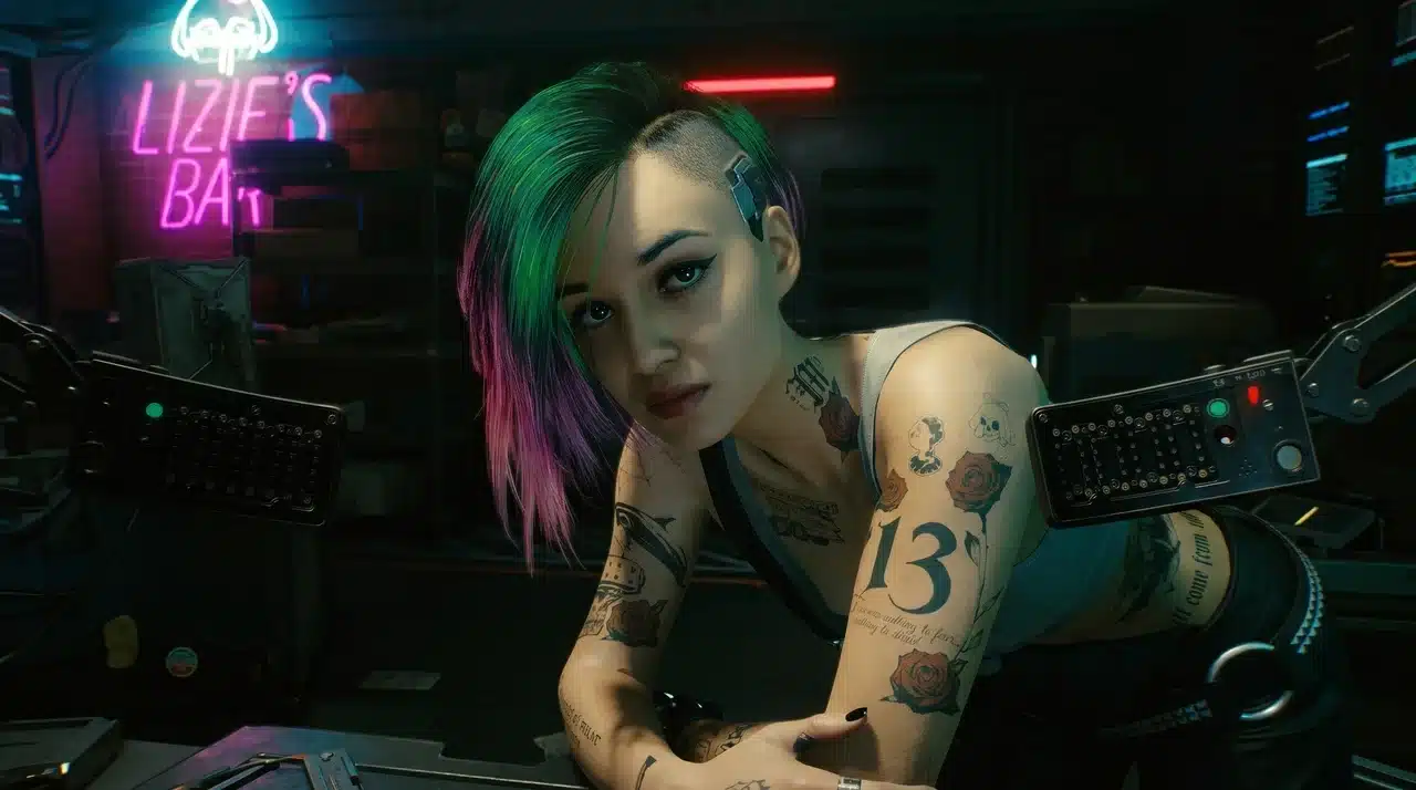 Judy Alvarez leaning on a control panel inside Lizzie's Bar in Cyberpunk 2077 during her early questline