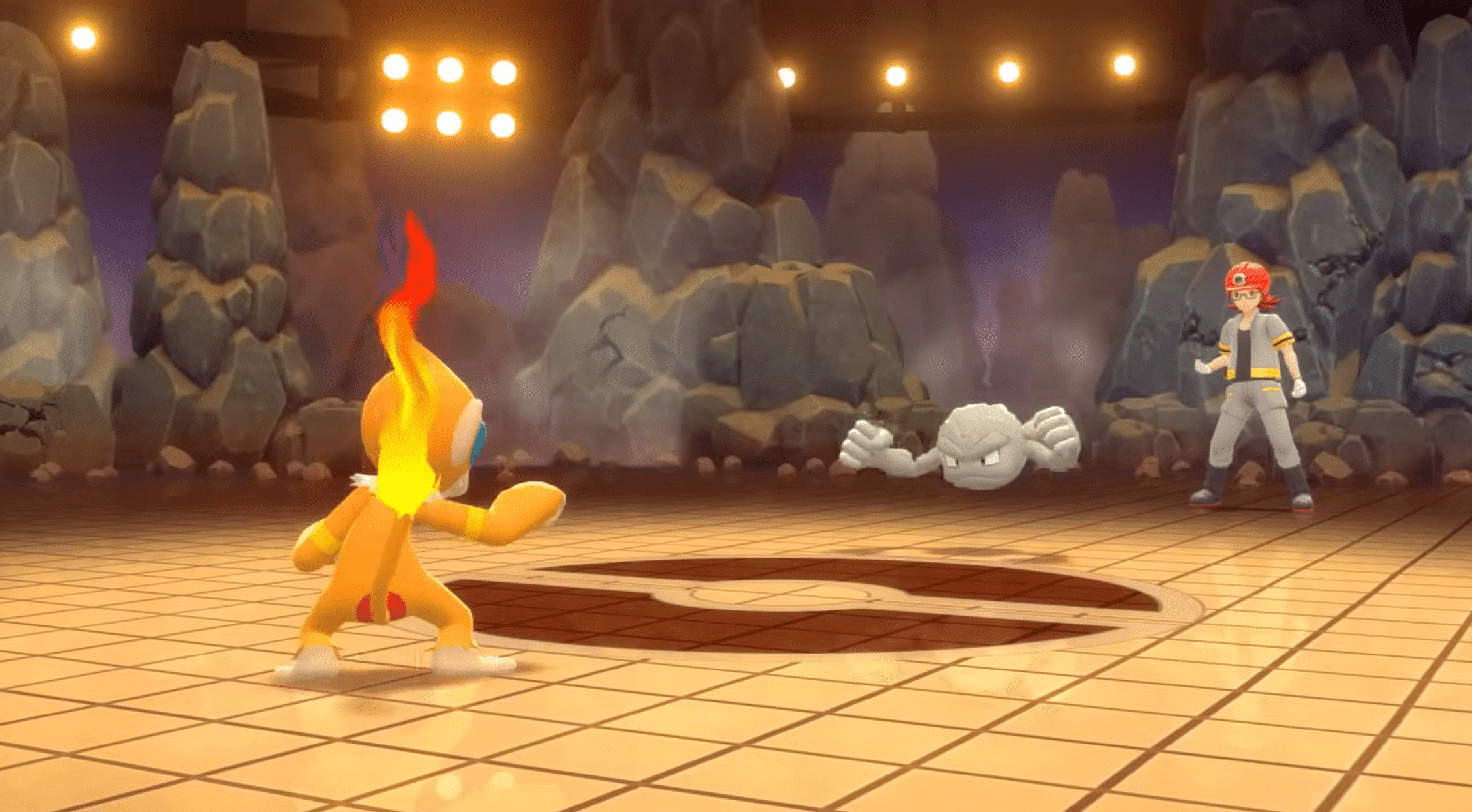 Monferno battles Geodude in a rocky Gym arena in Pokémon Brilliant Diamond.