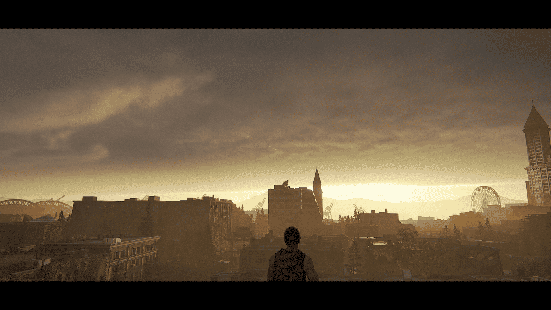 The Last of Us Part 2 scene showing a character overlooking Seattle at sunset
