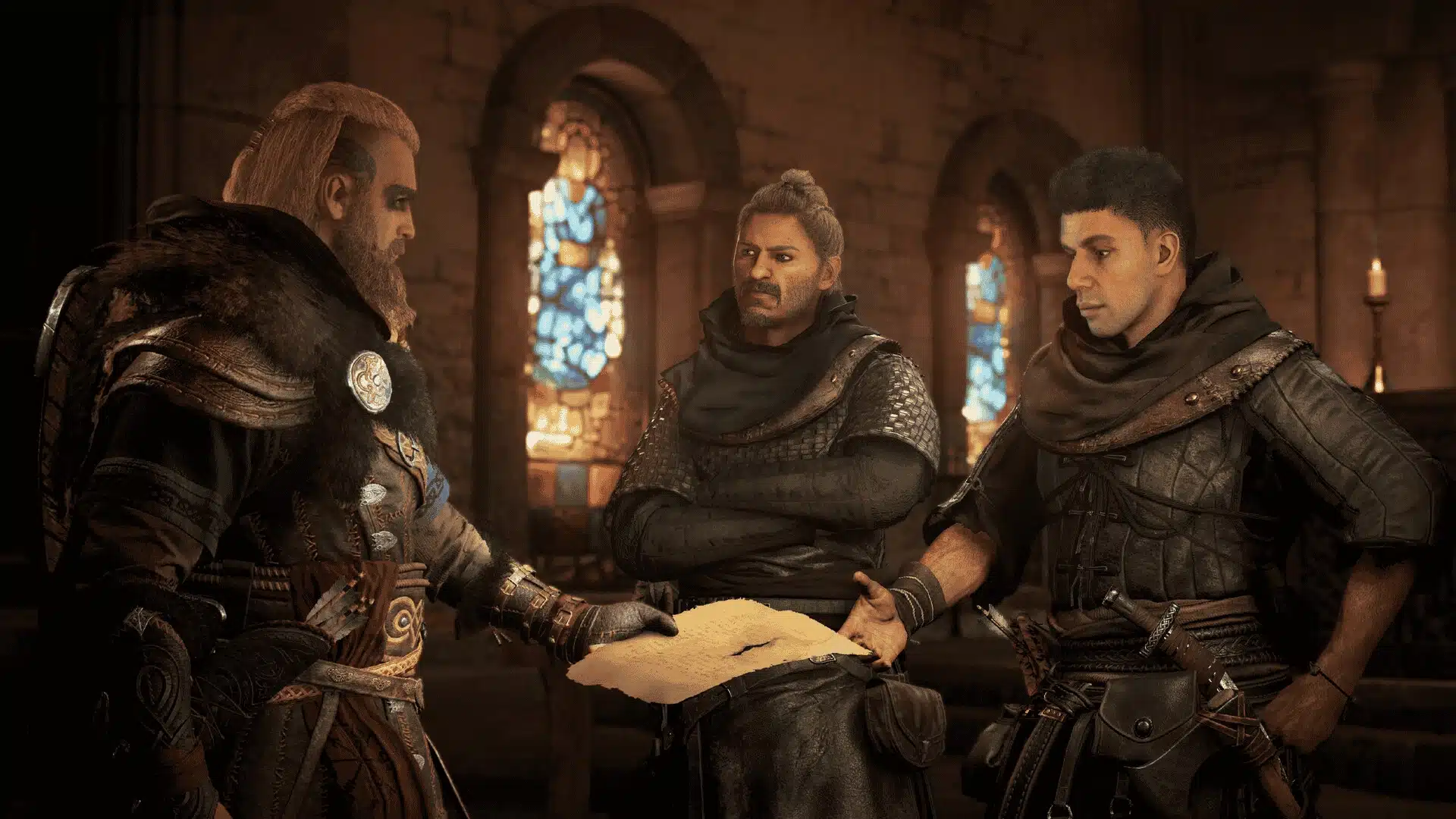 Three characters discuss a document inside a stone room with stained glass windows in Assassin's Creed Valhalla.