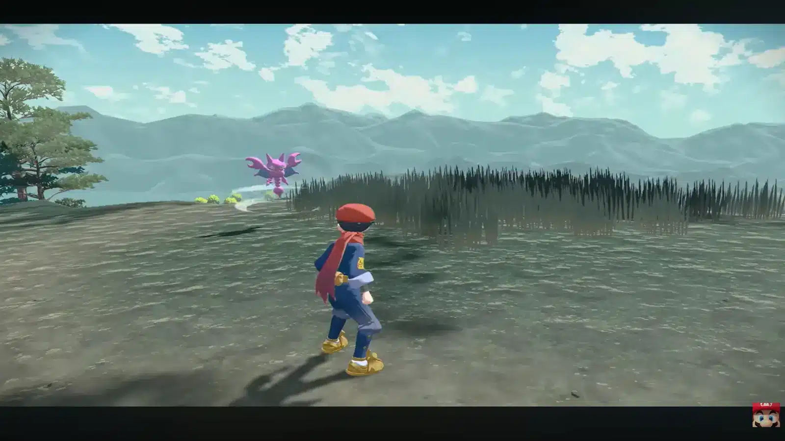 player character approaching a Gligar across a grassy mountain area in Pokémon Legends: arceus