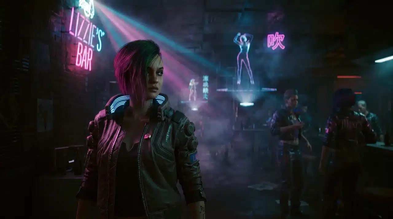 Judy Alvarez standing inside Lizzie's Bar in Cyberpunk 2077, the starting point of her romance questline.