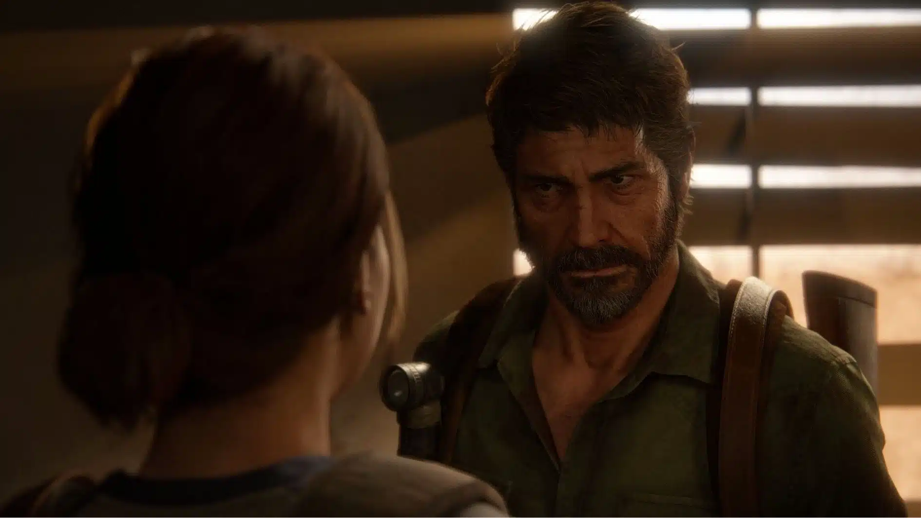Joel and Ellie facing each other in a tense scene from The Last of Us Part II