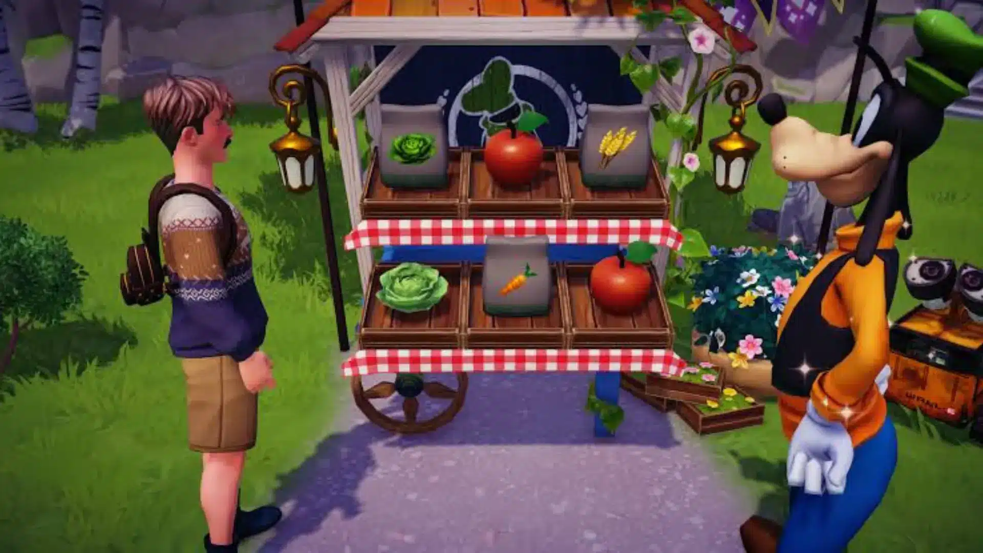 Player stands beside Goofy at his vegetable stall displaying lettuce, tomatoes, carrots, and wheat in Dreamlight Valley.