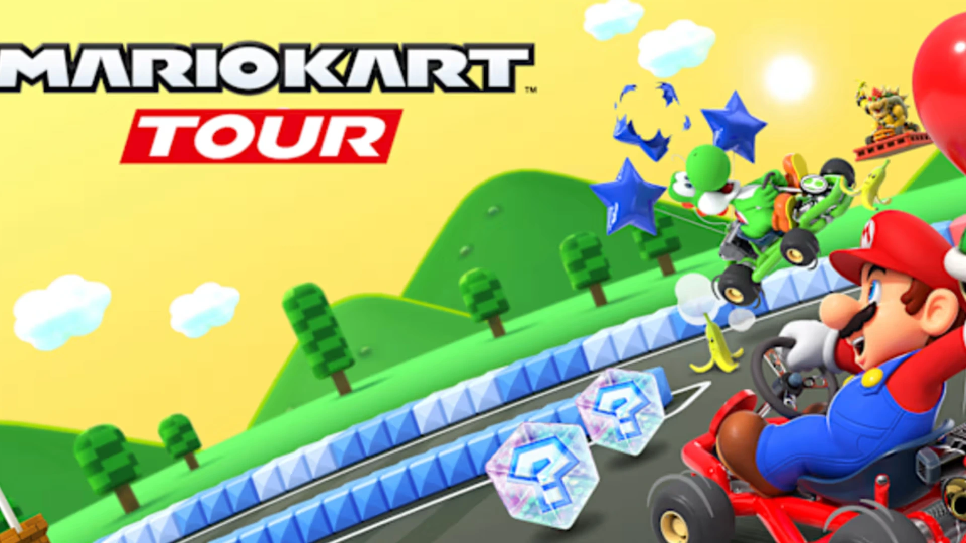 Mario Kart Tour scene with Mario racing on a colorful track with balloons and items