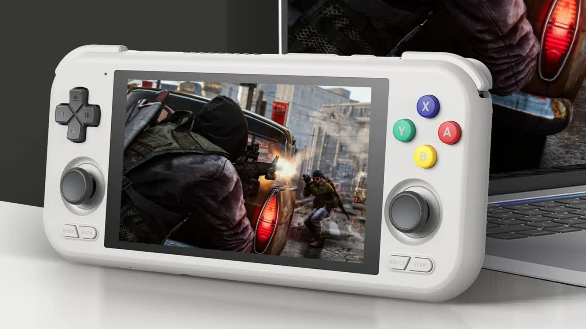 White Retroid handheld shown from front and back with colorful controls and vents