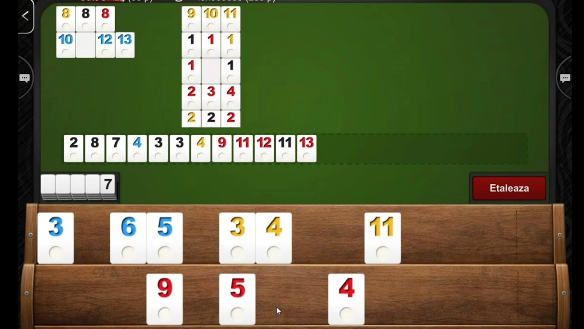 Online rummy game table showing cards player seats chips and a live match in progress