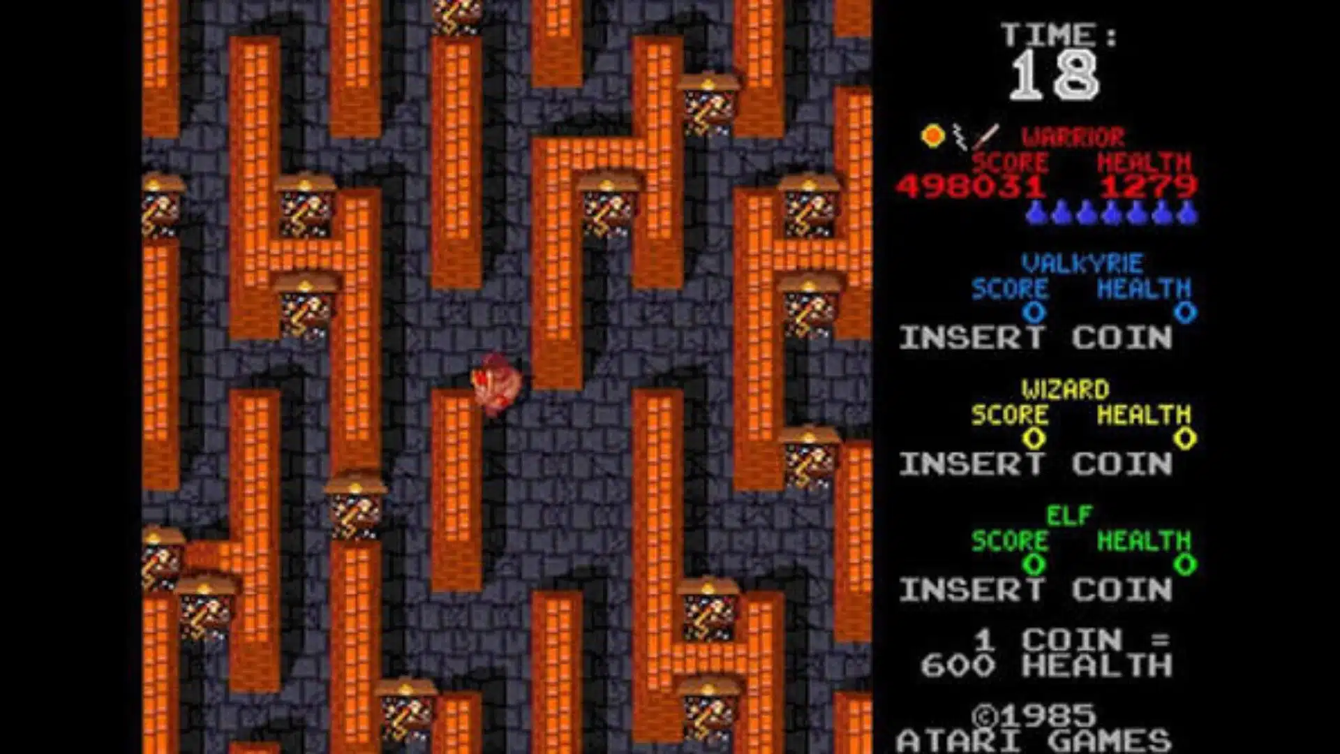 gauntlet arcade gameplay showing fantasy warriors exploring a dungeon filled with enemies