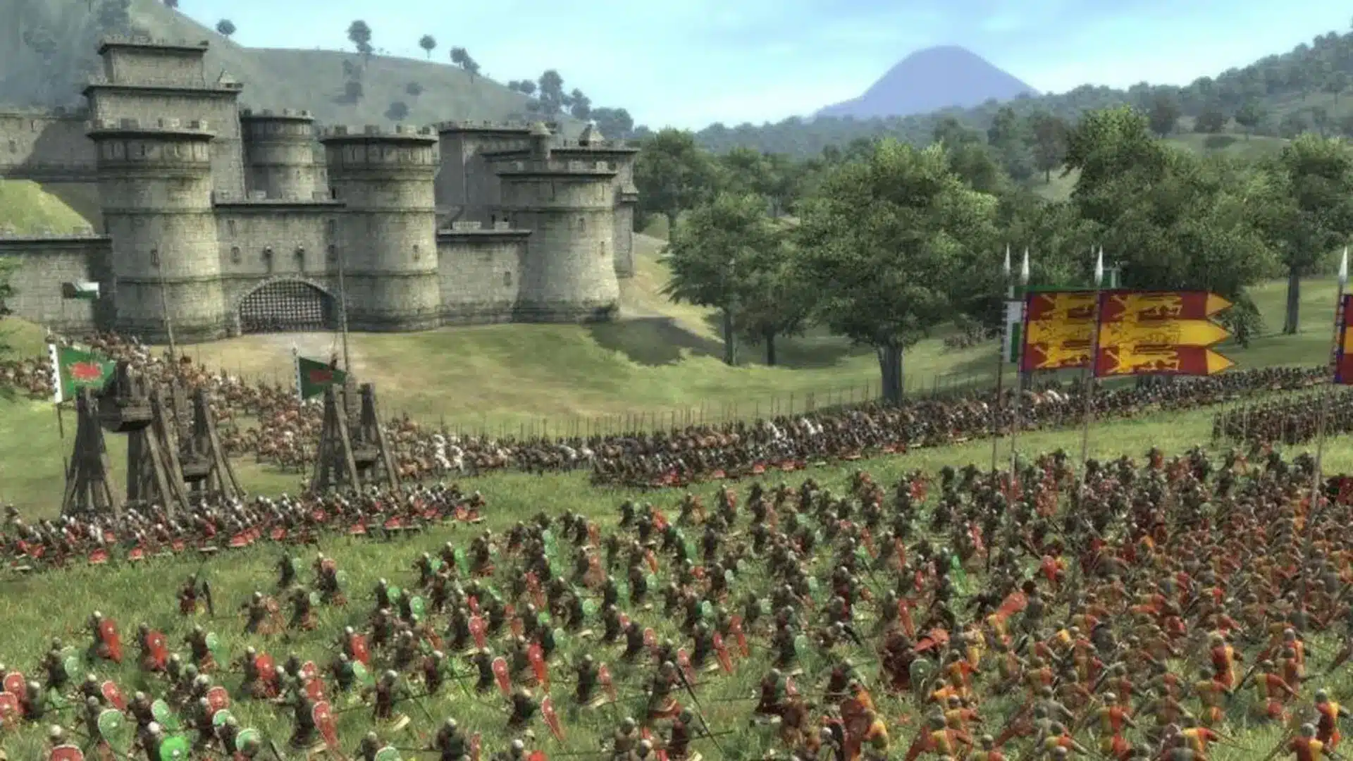 medieval two total war armies attacking a castle during a large battlefield siege