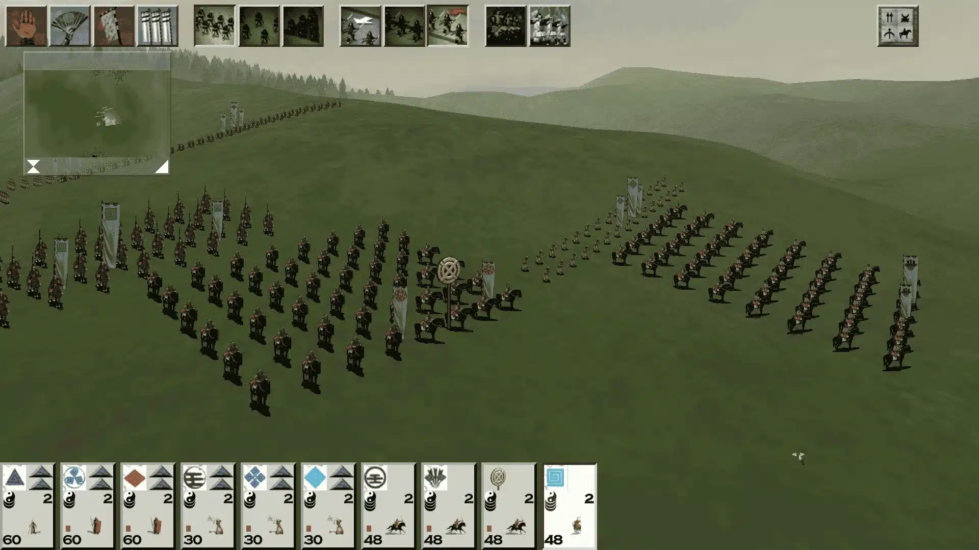 shogun total war armies arranged in formation across a battlefield with samurai units and strategic positions